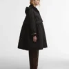 Barbour x GANNI Peplum lång quiltad jacka Barbour x GANNI Peplum lång quiltad jacka